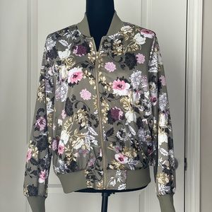 Green bomber jacket with flowers